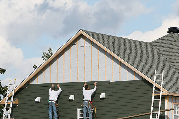Professional Emergency Siding Repair technician working in Jacobs Creek, PA